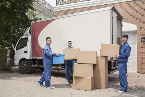 Removal team planning a move in West Kensington street setting