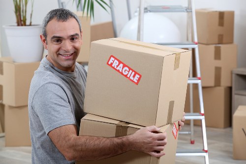 Packed boxes and furniture ready for a West Kensington house move