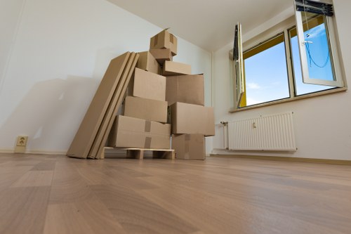 Charity donation items separated during a West Kensington house move