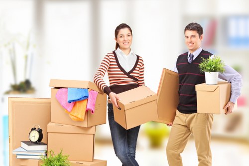 Careful moving team protecting items with insured service