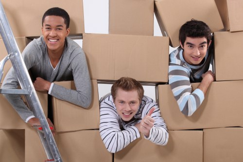 Packing and loading furniture into a moving van