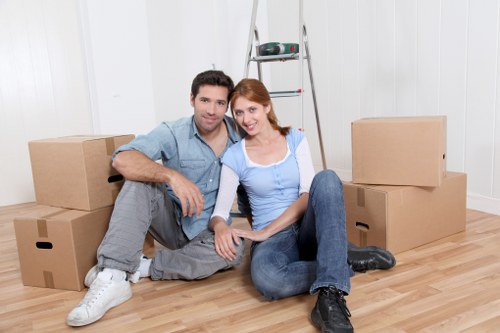 Packed household items ready for man and van transport in West Kensington