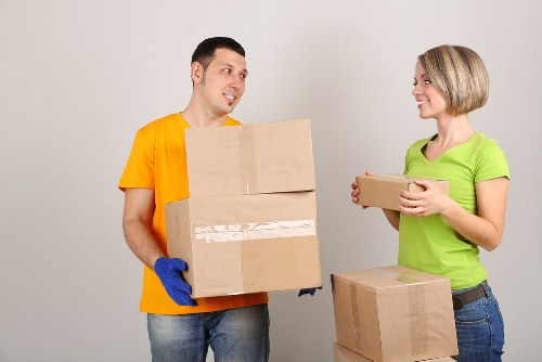 Loading furniture into a removal van in West Kensington